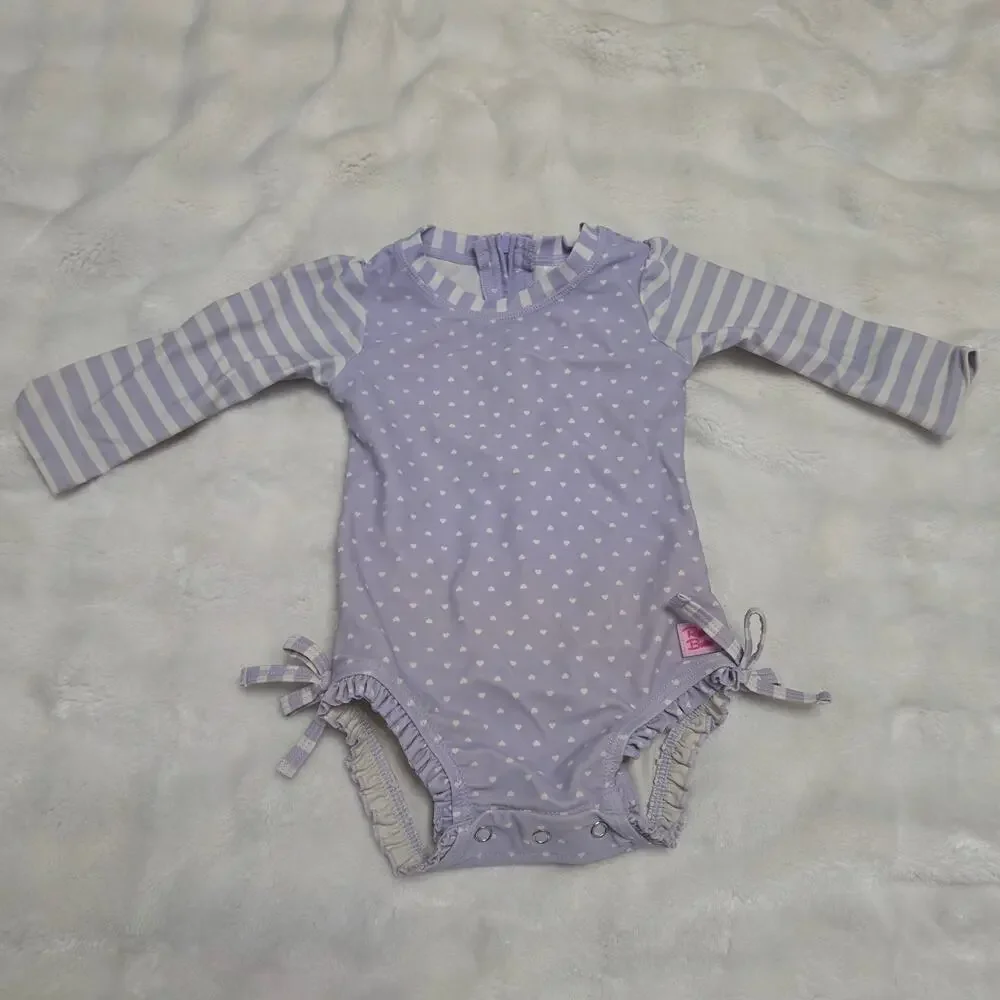 RuffleButts Baby Girl Lavender Heart Long Sleeve Rashguard Swim Ruffle One Piece